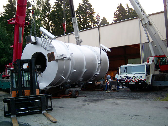 Loading a heavy equipment part